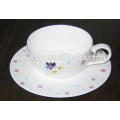 Chinese white ceramic coffee cup and saucer with decal